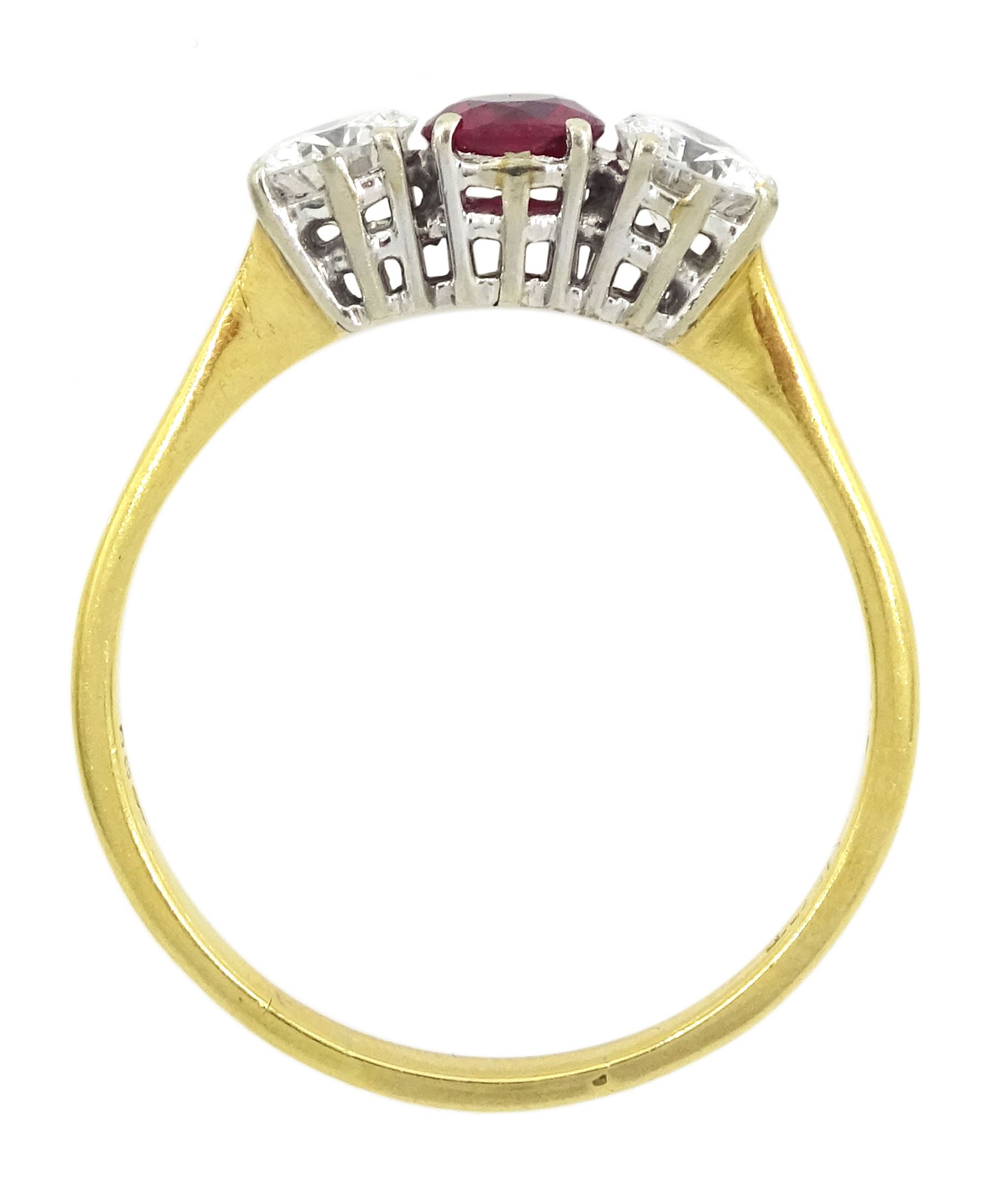 18ct gold three stone ruby and round brilliant cut diamond ring, London import mark 1973, ruby approx 0.30 carat, total diamond weight approx 0.55 carat