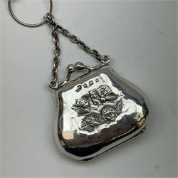 Victorian and later silver chatelaine, the shaped and foliate pierced clasp with embossed oval panel of a courting couple, hallmarked Levi & Salaman, Birmingham 1899, supporting six accessories on five chains: a circular mirror embossed with putti, hallmarked Henry Matthews, Birmingham 1911, pencil holder engraved with foliate scrolls, hallmarked Francis Webb, Birmingham 1914, conical scent bottle decorated with bamboo, (unmarked but testing as silver), aide memoire embossed with putti, hallmarked Samuel M Levi, Birmingham 1911, tape measure of compressed spherical form, hallmarked Henry Matthews, Birmingham 1899, and a purse with embossed putti, hallmarked Birmingham 1909, makers mark worn and indistinct, at longest point L31cm

