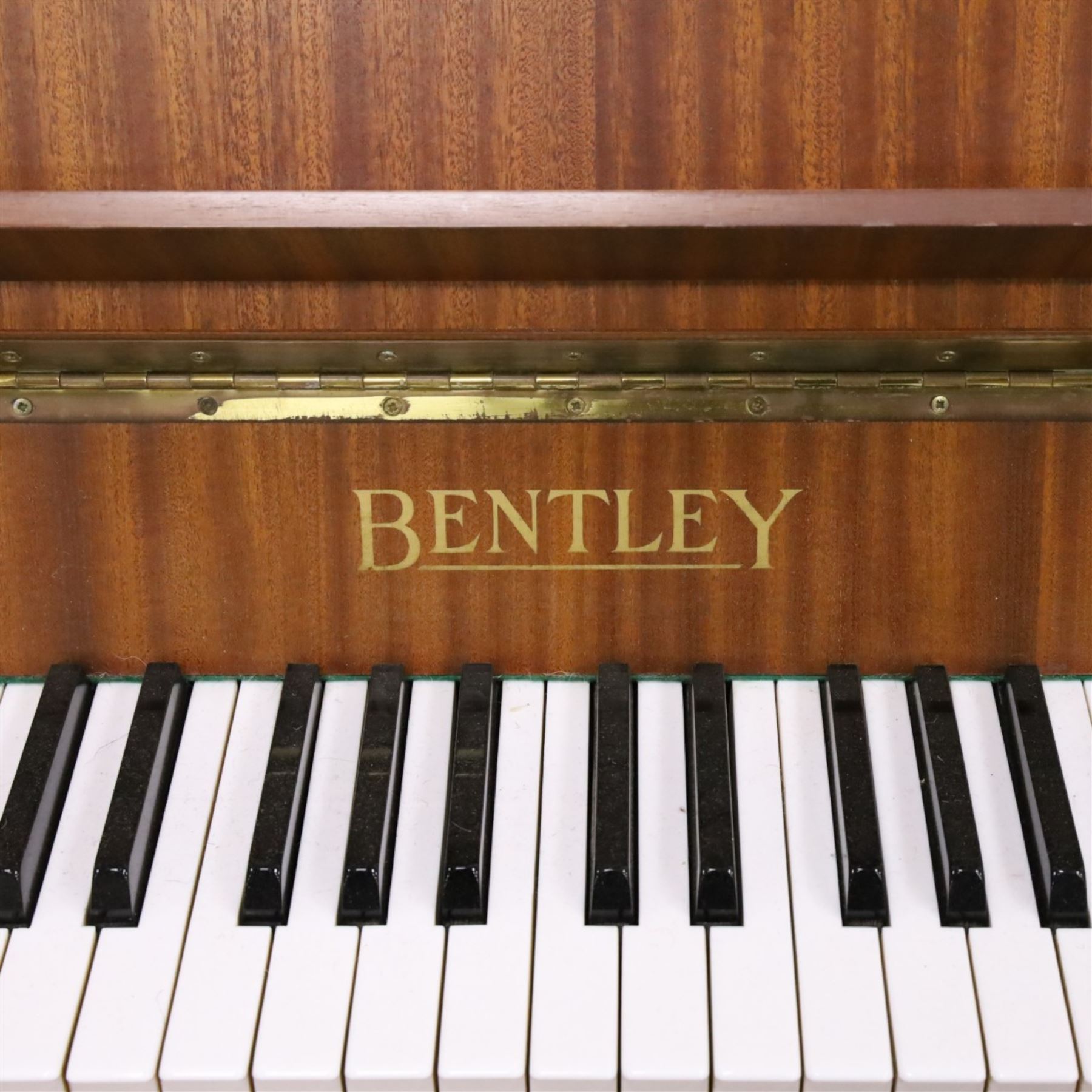 1970s Bentley upright piano, with teak effect veneer, serial no. 138837, H100cm