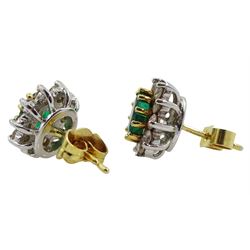 Pair of 18ct gold oval emerald and round brilliant cut diamond cluster stud earrings, hallmarked, total emerald weight approx 0.60 carat, total diamond weight approx 0.40 carat