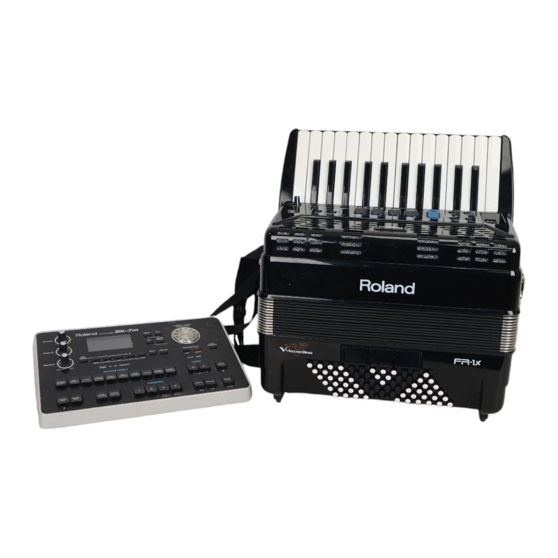  Roland FR-1X piano accordion (uncased)13 fold bellows two octave keyboard with 26 keys, 72 buttons, classic, jazz,ensemble, brass, wind, piano, and guitar samples. With a Roland BK-7m Backing Module, leads and tutorials.
