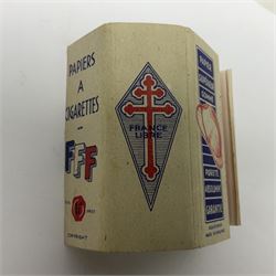 WWII Free French 1944 card member's insignia; and unused 1944 pack of FFF cigarette papers (2)