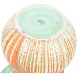 Four pieces of Shelley Harmony dripware, comparing ginger jar and three jugs, largest jug H23cm