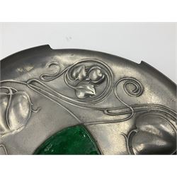 Liberty & Co Tudric pewter Bollelin tray, designed by Archibald Knox, of circular form with shaped edge, cast in relief with foliate tendrils surrounding a green enamel cartouche, impressed beneath Made by Library & Co English Pewter 044, D25.5cm