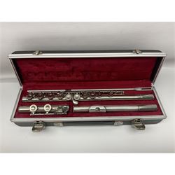 Boosey & Hawkes London Regent three-piece flute, serial no.345447; in B&H Bandhite hard carrying case; and Deg Music Company Inc. USA Claudel Model three-piece flute, serial no.491718, in hard carrying case (2)