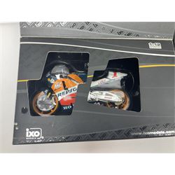 Three Ixo Models 1:12 scale die-cast models of motorcycles - BRB007 Honda NSR500 Michael Doohan 1998; BRB001 Honda RC211V Valentino Rossi 2003; and Yamaha YZR-M1 Colin Edwards MotoGP Phillip Island 2007; all boxed (3)