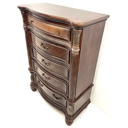 Kevin Charles American walnut serpentine chest, five graduating drawers, half turned fluted column carving, turned supports 