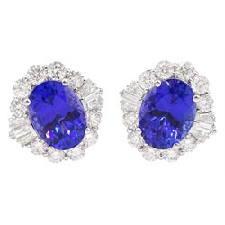 Pair of 18ct white gold oval tanzanite, baguette and round brilliant cut diamond cluster stud earrings, total tanzanite weight 7.37 carat, total diamond weight 2.01 carat, with World Gemological Report