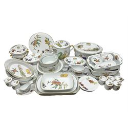  Royal Worcester Evesham pattern, including covered pot de cremes, twin handle tureen, serving dishes, flan dishes, side plates etc  