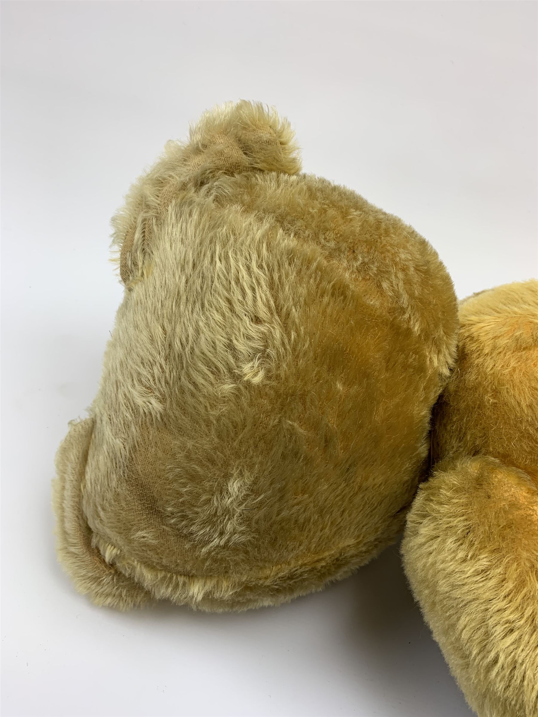 Very large Irish Tara bear c1950s with plush covered body, swivel jointed head with glass eyes and vertically stitched nose and mouth, jointed limbs with rexine pads and growler mechanism H37