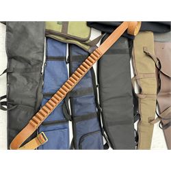 Collection of gun slips, including BSA guns and napier examples and leather 12-bore cartridge belt 