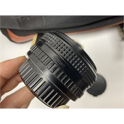 Four camera bodies, to include, Ricoh KR-10 serial no. 38826, Pentax MZ-M serial no. 4185969 with 'SMC Pentax- M 1:3.5 28mm' lens, Canon EOS500 serial no. 080927, with 'Sigma Zoom 100-300mm 1:4.5-6.7 DL'  lens etc, with other camera lenses and equipment 