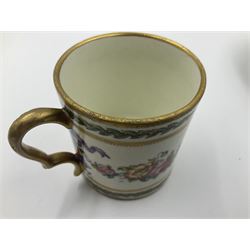 Sèvres soft paste porcelain coffee can and saucer with date code for 1780, painted with pink oval panels bordering bouquets of flowers, united by swags of flowers tied with purple ribbons, within laurel leaf borders, interlaced LL monogram enclosing date letters CC above painters marks for Nicquet, coffee can H7.5cm, saucer D15cm