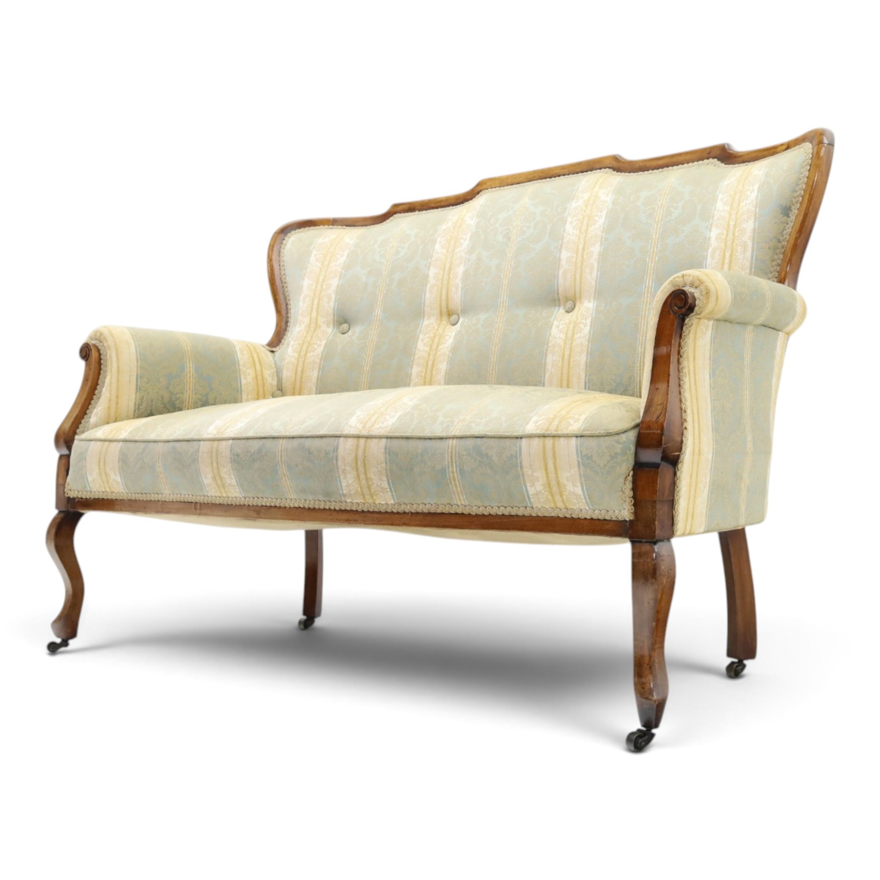 Edwardian mahogany three-piece salon suite, comprising settee and two armchairs, shaped frames with upholstered backs, scrolled arm supports and serpentine seat rails, upholstered in striped floral damask fabric, on cabriole supports with castors (Armchairs: H 96cm, W 70cm, D 68cm)