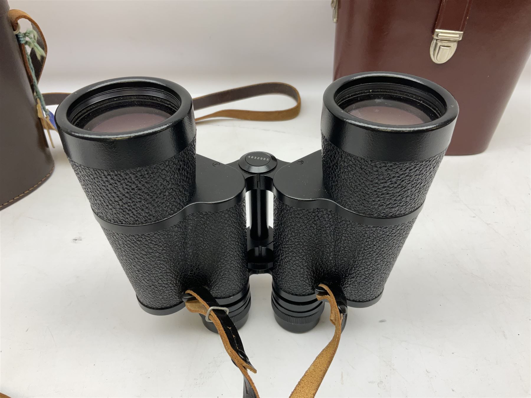 Carl Zeiss Jena Jenautic 7 x 50 binoculars, serial no. 4832985, together with a further Ross London 12 x 40 pair, both with cases