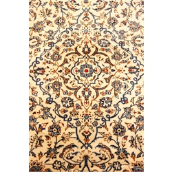  Kashan beige and ground rug, central medallion, floral field with repeating border, 355cm x 247cm  