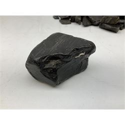 Collection of raw Whitby jet including large piece with one polished side, approx 4lbs