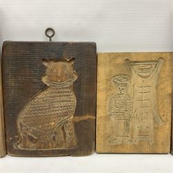 Collection of 20th century hardwood Dutch folk art Speculaasplank or biscuit moulds, most examples typically carved with figures in traditional dress, largest H35cm