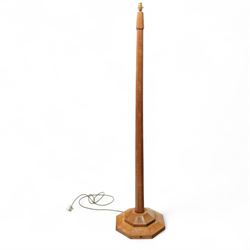 Squirrelman - oak standard lamp, the octagonal stepped base carved with the signature squi...