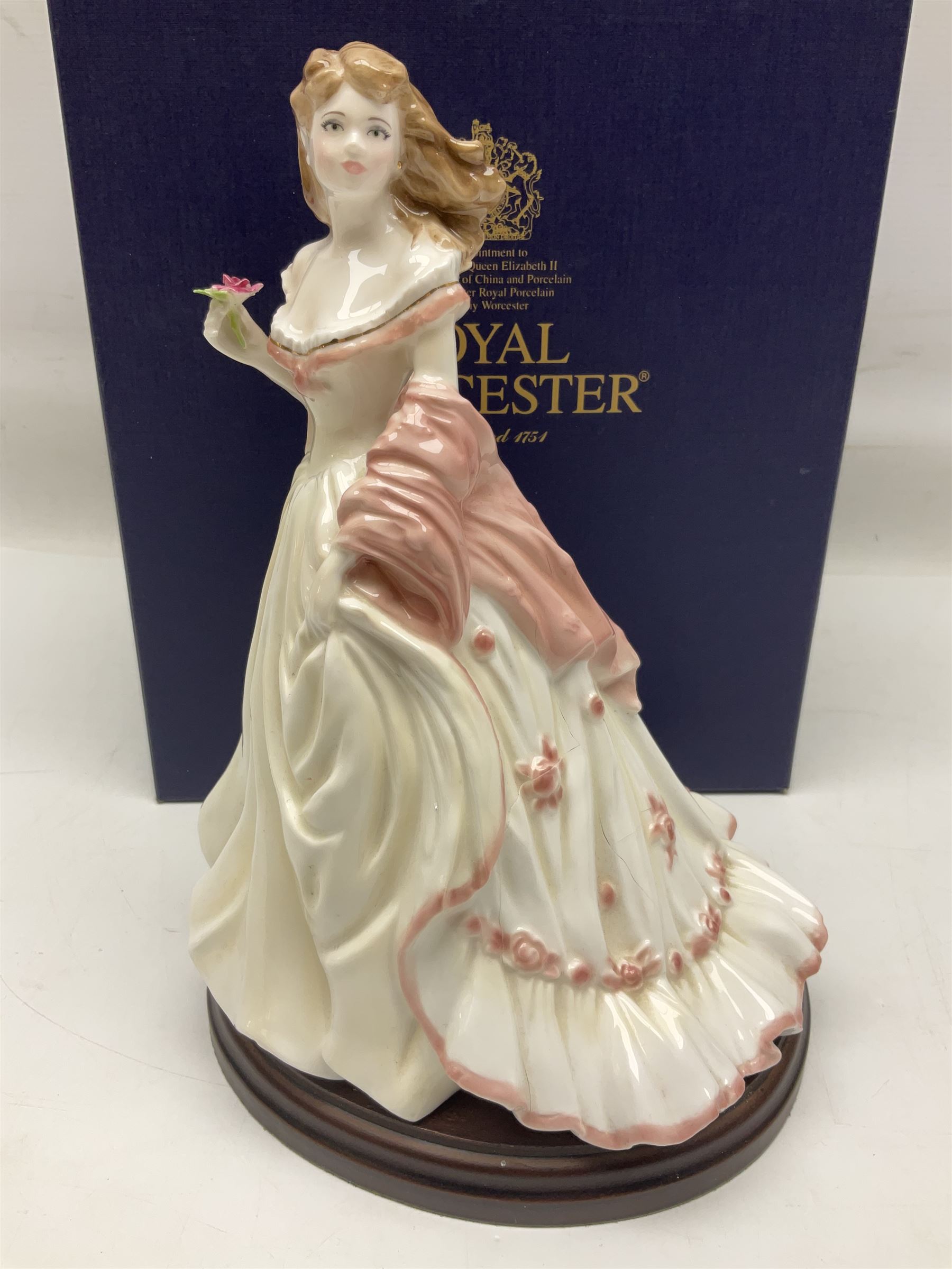 Three Royal Worcester figures, comprising Glyndebourne, with original box, Royal Worcester Special Even 1998 Elizabeth, with certificate and original box, and In Celebration of the Queens 80th Birthday 2006 