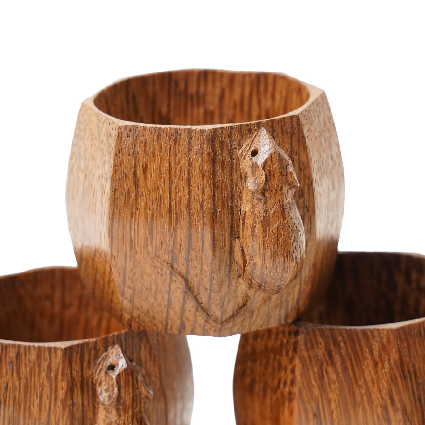 Mouseman - set of six oak napkin rings, with carved mouse signature, by the workshop of Robert Thompson of Kilburn