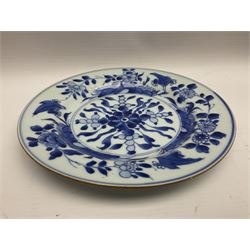 Japanese Meiji period Arita blue and white plate, of circular form, painted with riverside landscape and bird upon flowering branch, with character mark beneath, D24.5cm, together with two 18th century Chinese blue and white plates, each painted with floral design, each approximately D22.5cm