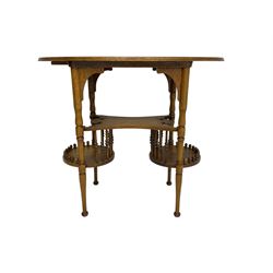 Early to mid-20th century oak occasional table, oval top over under-tier with scrolled foliate edges, connected to two circular lower tiers with spindle supports