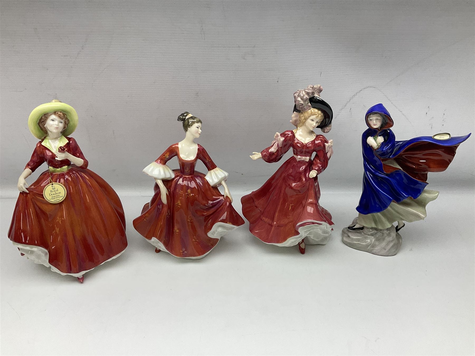 Ten Royal Doulton figures, to include Lydia HN1908, Goody Two Shoes HN2037, May HN2746, A Single red Rose HN3376, etc, nine with original boxes 