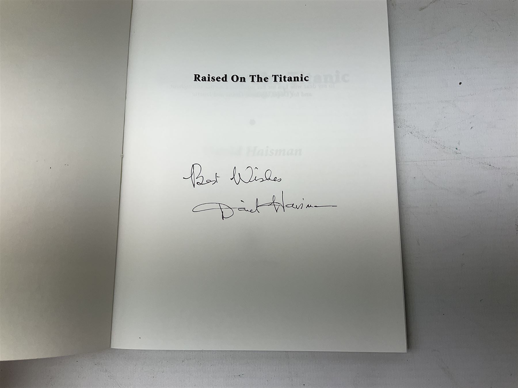 Titanic cover with Canadian cancellation signed David Haisman and cover with Queenstown cancellation signed by stamp designer, book signed David Haisman, two Titanic covers and book signed David Haisman, Titanic Facsimile postcard signed David Haisman and cover with Alderney cancellation signed by stamp designer, Biography of Edith Brown signed David Haisman (9)