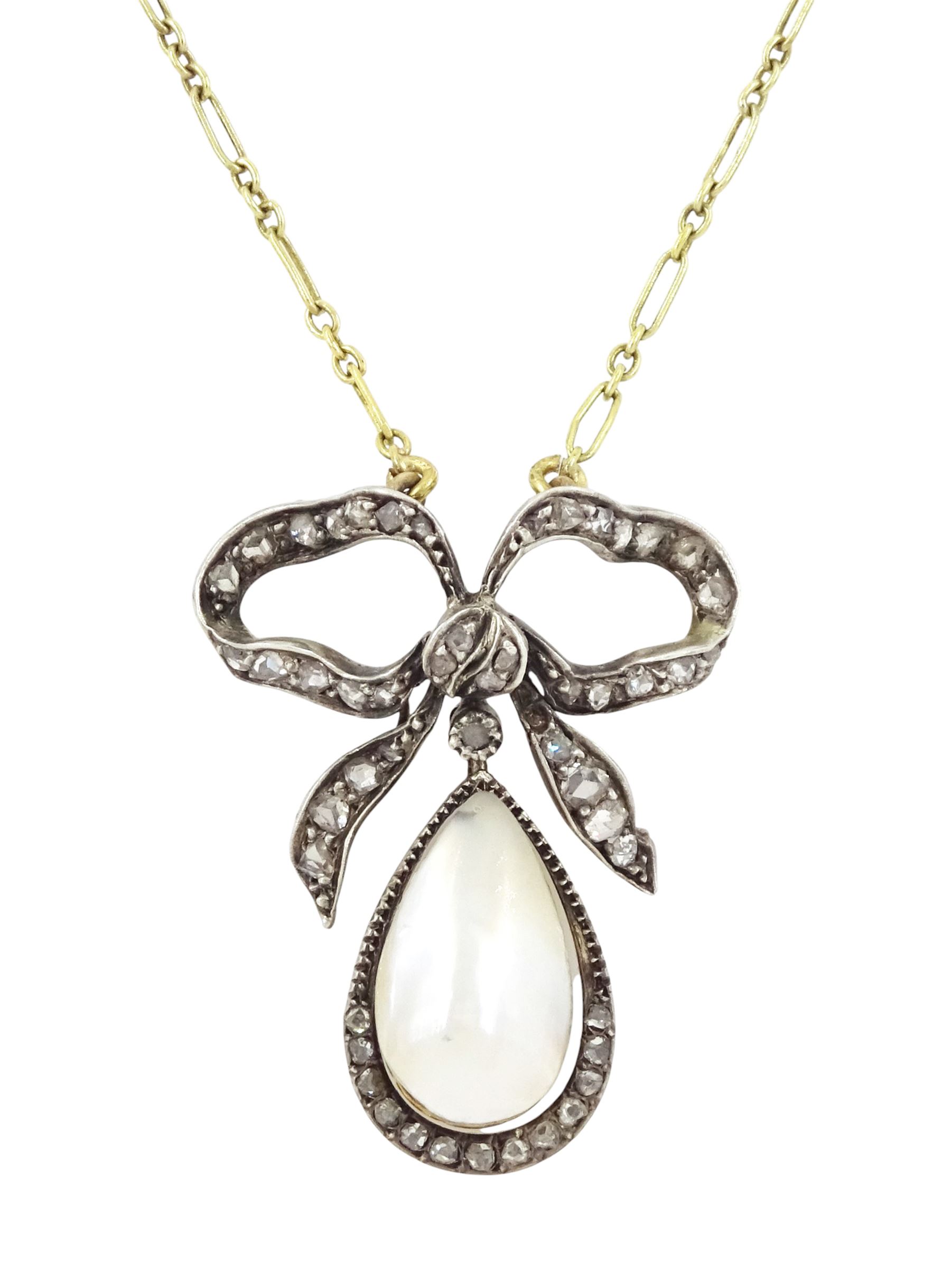 French early 20th century gold and silver pearl and diamond bow pendant, pear shaped blister pearl with old cut and rose cut diamond surround, suspending from a diamond set bow, to an 18ct gold fancy link chain necklace