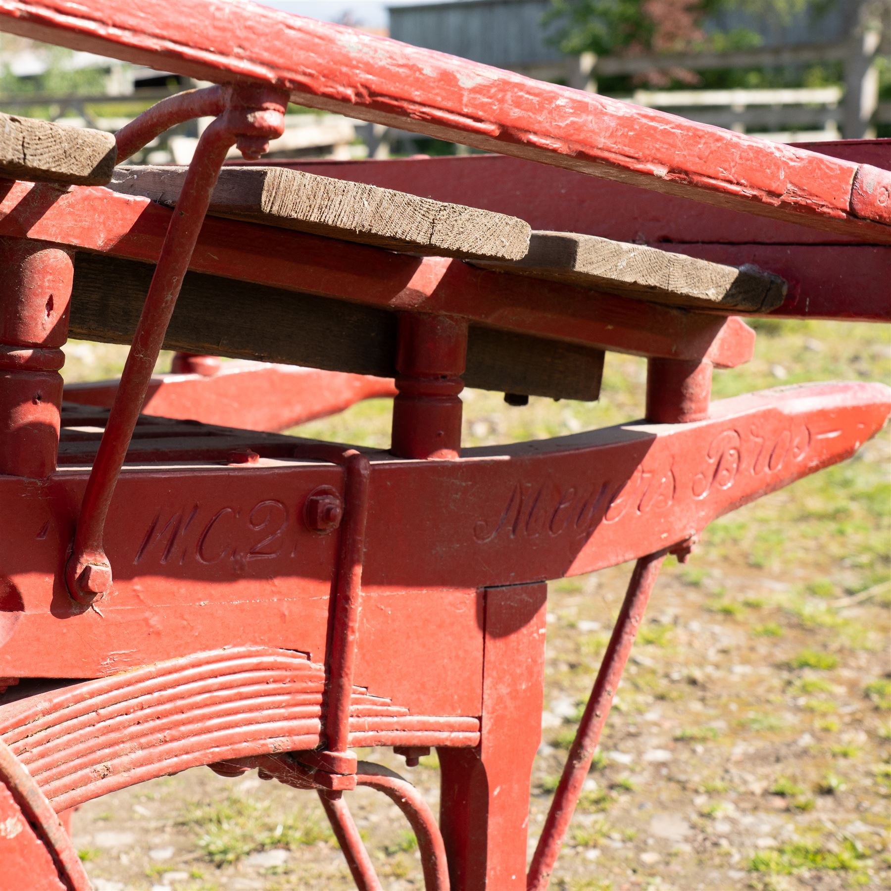 Costermonger’s Cart

A painted costermonger’s cart with red timber frame, slatted deck and wooden spoked wheels. The cart has long hand rails, raised side rails and turned supports, with incised inscriptions to the frame, including “Meyers Bros”. The form is consistent with a hand drawn market cart, used for carrying and displaying produce or goods.

Features:
Red painted timber frame
Slatted wooden deck
Wooden spoked wheels
Long hand rails
Raised side rails
Turned timber supports
Incised inscriptions to the frame
“Meyers Bros” inscription visible
Traditional market cart form

Dimensions:
Length: 240 cm (body approximately 210 cm)
Width: 102 cm
Height: 92 cm

Wheel diameter: 67 cm