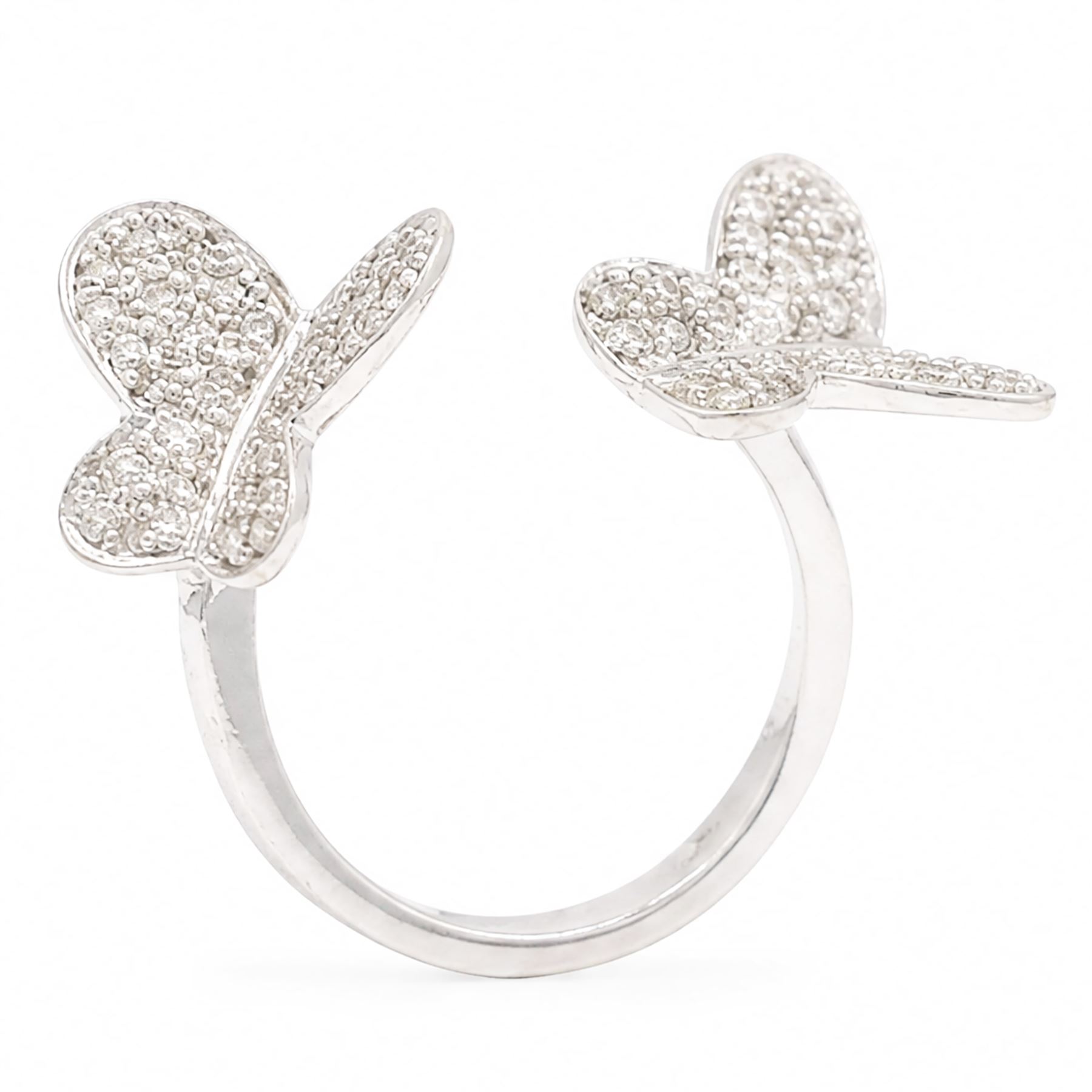 18ct white gold diamond butterfly ring, pave set with single cut diamonds, stamped 750