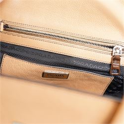 Prada - ‘Sound Lock’ satchel in Naturale Glace Calf leather, with silver-tone push-lock fastening, twin rolled handles, detachable and adjustable shoulder strap and hanging leather clochette, with original product tag, authenticity cards and dust bag