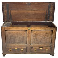 18th century oak mule chest, moulded hinged lid over panelled front, fitted with two moulded drawers