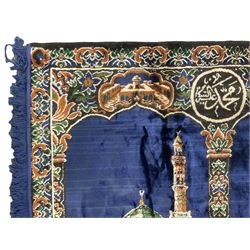 Indigo ground family prayer rug, depicting Masjid al-Haram in Mecca within floral design borders 