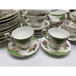 Paragon Rockingham pattern part tea and dinner service including three teapots, milk jug, cups and saucers of various sizes, ten soup bowls, ten side plates, ten dinner plates etc (96)