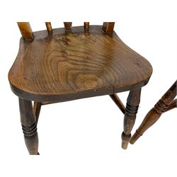 Near pair of Victorian elm and beech farmhouse kitchen chairs, pierced splat over shaped saddle seat, on ring turned supports