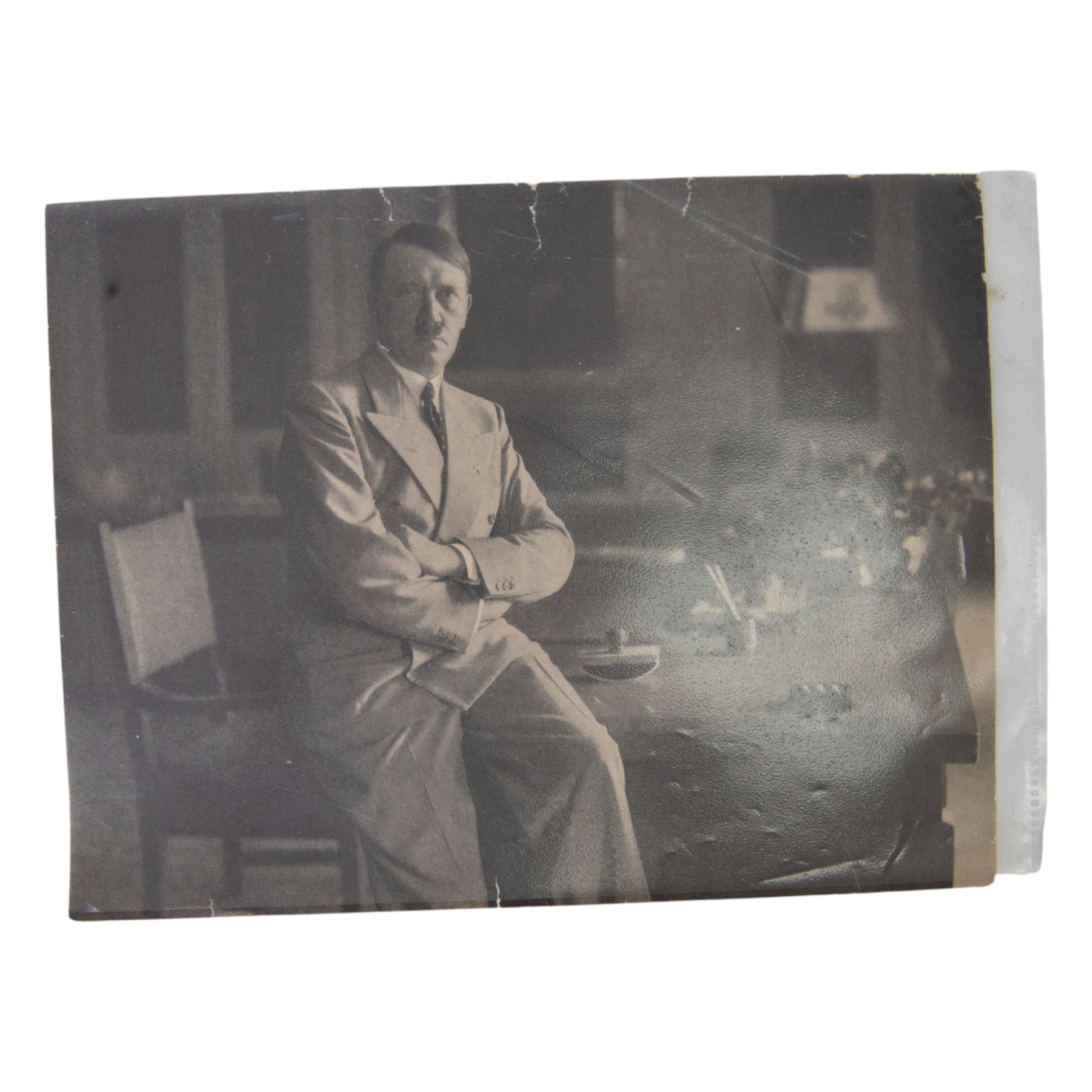 Photograph of Adolf Hitler, together with photograph of Hitler's neice Geli Raubal, an original types letter from Hitler's sister Laula Hitler and a spare savings book belonging to Hitler 