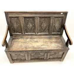 19th-century oak settle, for panel carved back, scrolling arms, single hinged seat, three panel carved front, stile supports