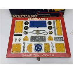 Meccano - Outfits 2, 3 & 4 with blue and yellow parts; look to be virtually complete with most apertures filled; together with a partially stocked Meccano Elekrikit; all boxed with instruction manuals (4)
