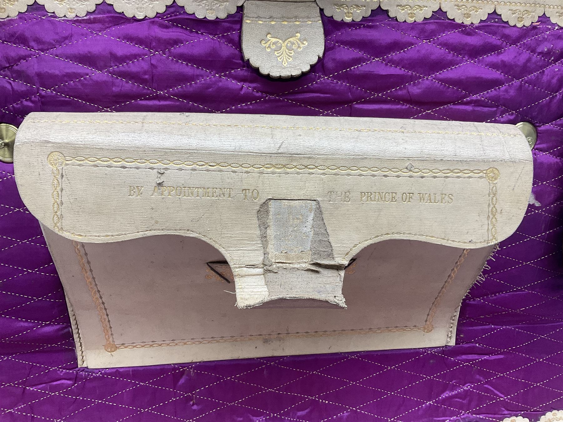 19th century leather suitcase, with brass plaque to cover engraved 'C R F Lutwidge Esq', the pink silk and white kid leather interior with pouch and edging impressed with gilt lettering reading 'By Appointment of Prince of Wales J W Allen 37 Strand Maker Prize Medal Awarded', H21cm, W73cm, Notes: Charles R. Fletcher Lutwidge, was mayor of Tunbridge Wells between 1895-1898, and again between 1901-1902