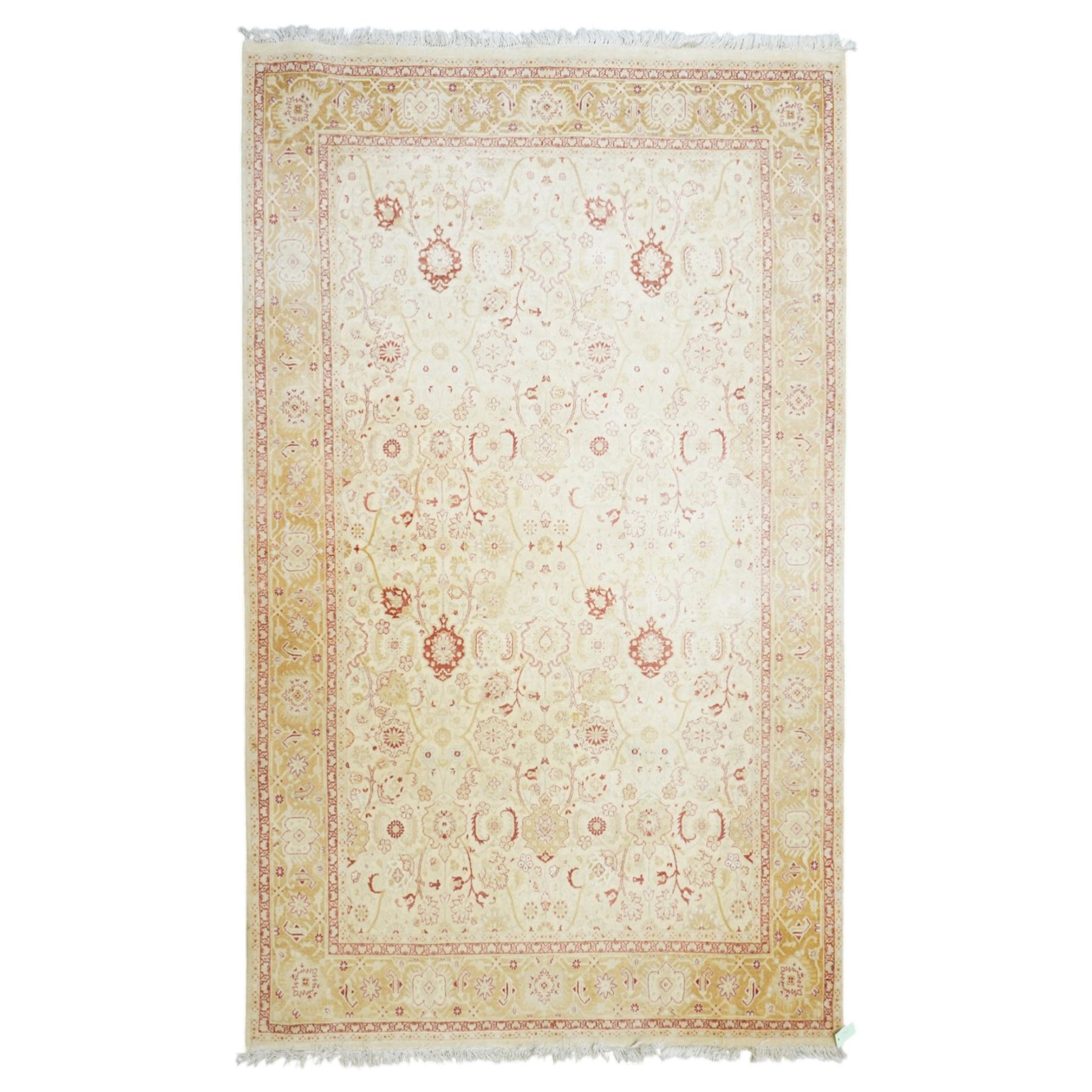 Modern Pakistani Oushak style wool hand-knotted carpet,  ivory field with an all-over scrolling floral vine design in soft tones of madder red and pale gold, enclosed by a conforming border, with cotton fringe ends  