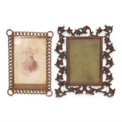 19th Century gilt metal photograph frame of easel form with Rococo scroll decoration, together with three brass link frames, largest H22cm 