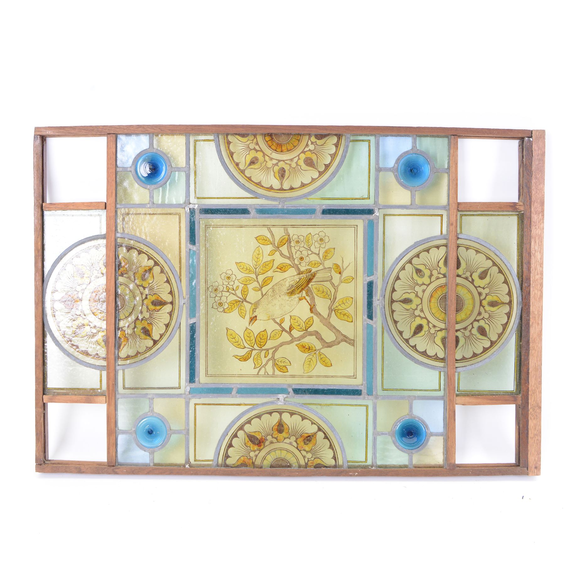 Two stained glass leaded panels each decorated with birds in foliate to to the centre, together with another panel with a female figure to the central panel, largest L78cm, H53cm