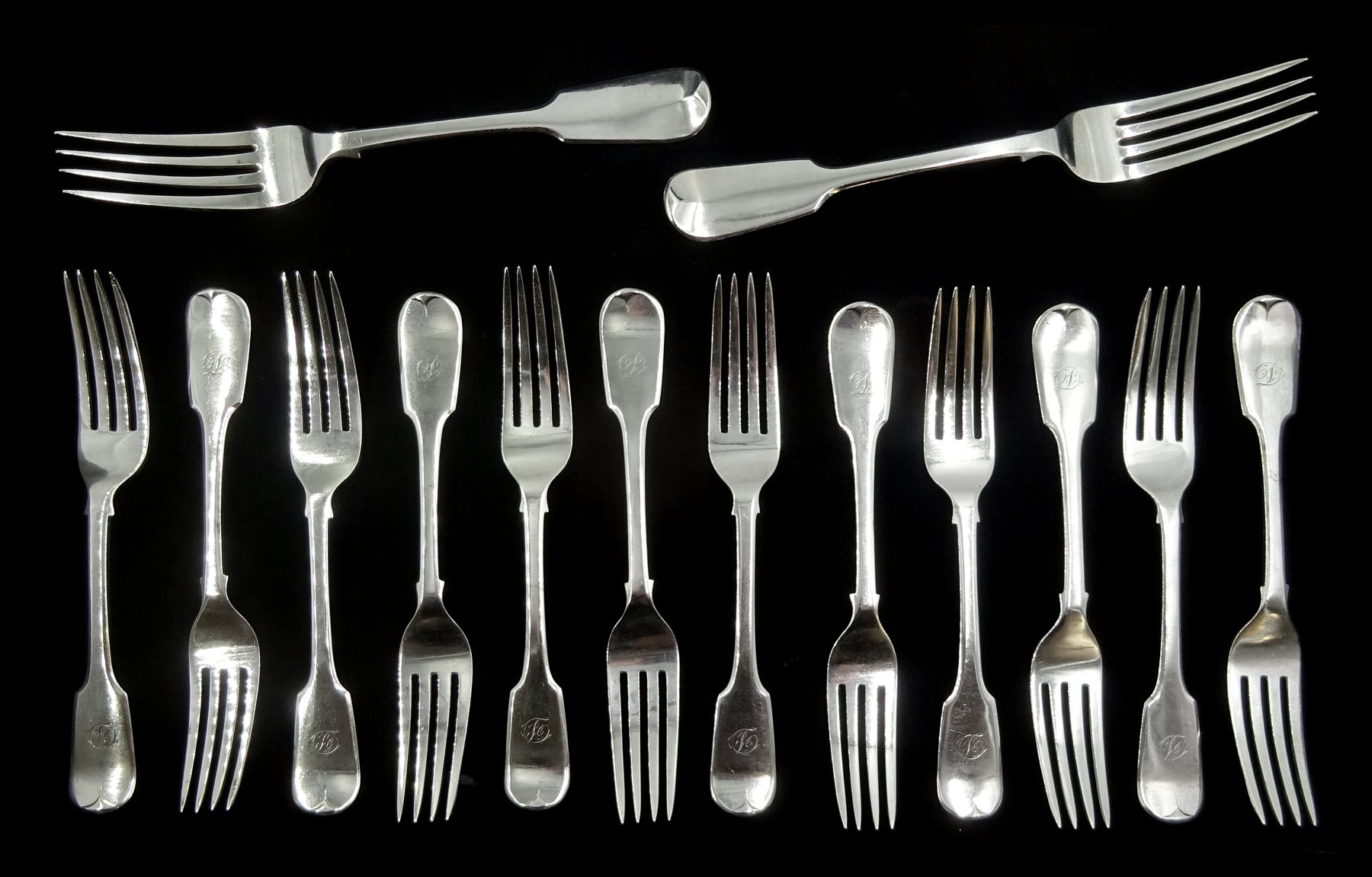 Set of twelve Victorian silver dessert forks, Fiddle pattern by Samuel Hayne & Dudley Cater, London 1841 and two similar dinner forks by Henry Holland, London 1856, approx 22oz