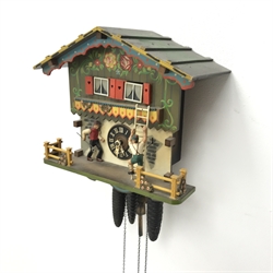 Two Black Forest style wall hanging cuckoo clocks