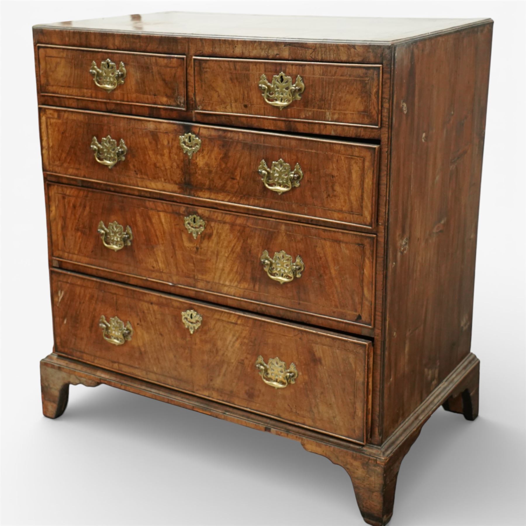 Georgian mahogany chest of drawers, the rectangular top above two short drawers over three long graduated drawers, each with brass swan neck handles and escutcheons, raised on shaped bracket feet