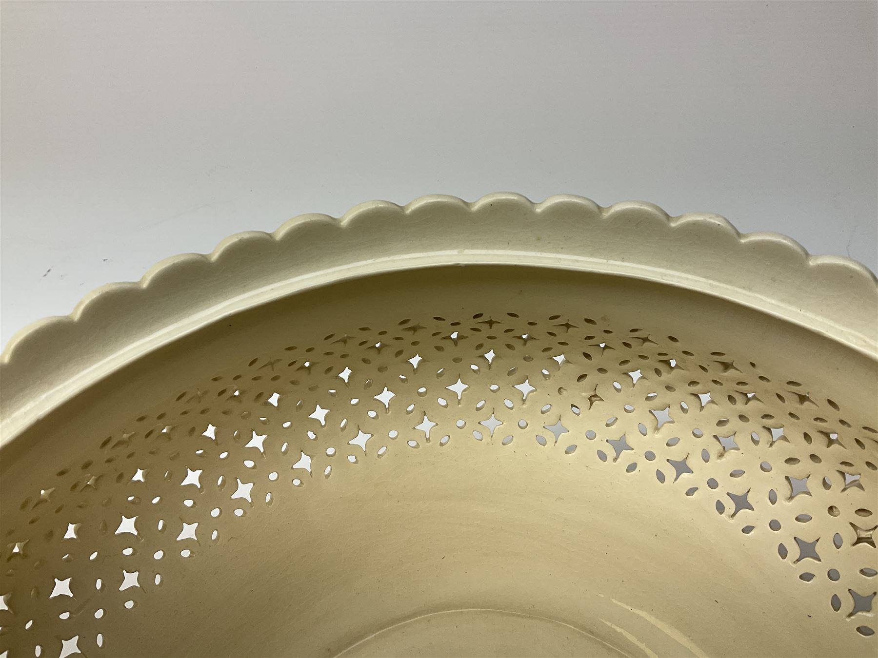 Large 20th century Leeds pottery basket and cover, of bulbous form with pierced detail and twin rope handle, with impressed mark beneath, H23cm D25cm