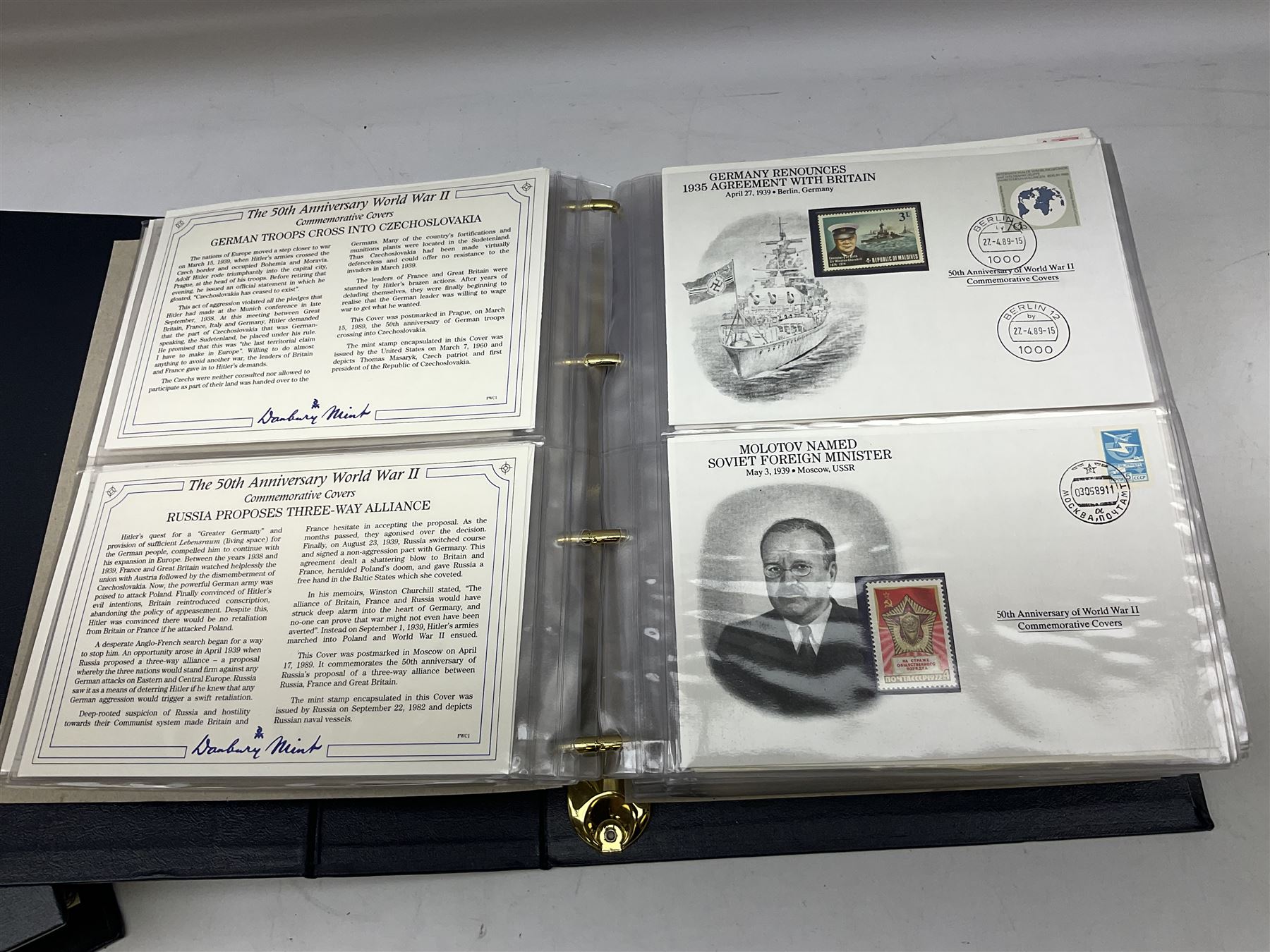 Three albums of 'The 50th Anniversary World War II Commemorative Covers Collection', housed in the official Danbury Mint folders