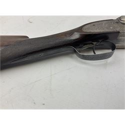 Smith Midgley Bradford 12-bore side-by-side double barrel side-lock ejector shotgun with 71cm barrels, engraved action with patented top lever, ivy leaf fences and top safety, walnut stock with chequered grip and fore-end, serial no.62409 to barrels and 1481 to action, L115cm overall SHOTGUN CERTIFICATE REQUIRED